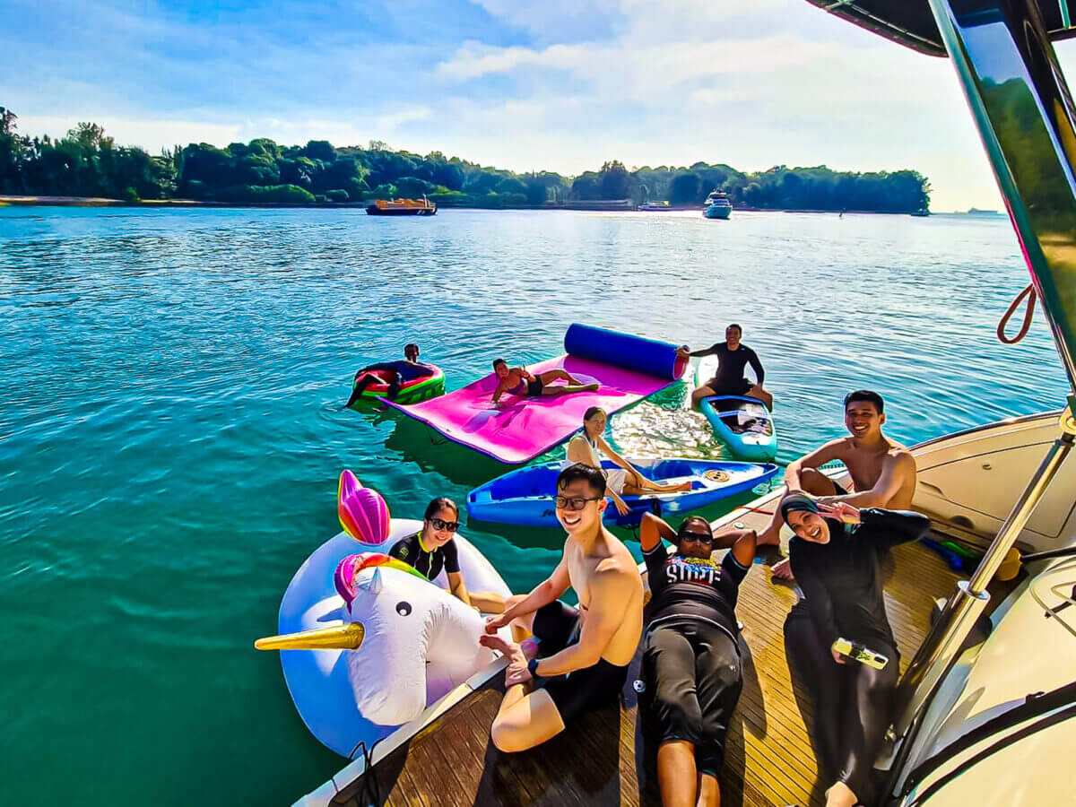 water activities with giant slide, giant float and water toys on yacht charters in Singapore